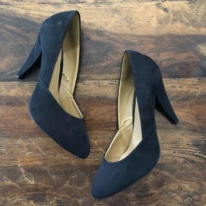 Black almond toe shaped classic heels.